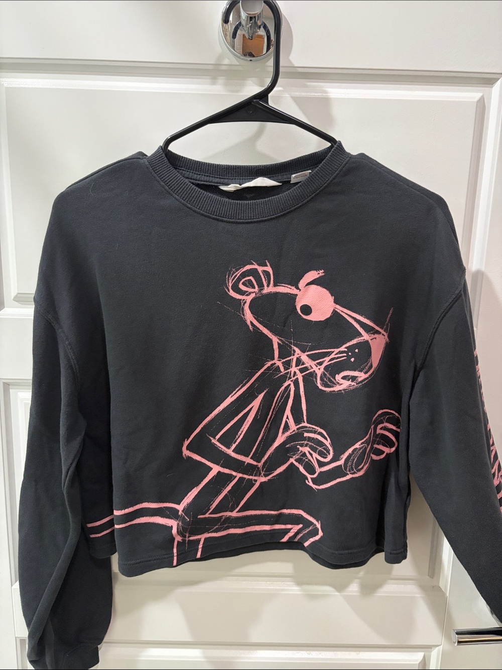H&M Black Sweatshirt with Pink Cartoon Panther Graphic